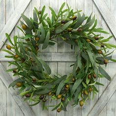 PRICES MAY VARY. Unique Design & Handcraft : The Green Olive leaves wreath is handmade of top & safe materials. Each one is unique specially handmade.Welcome your guests with this door wreath ! Hang it on your front door for a garden-inspired touch,. If you are looking for that wreath to embellish your seasonal decor, this is the decorative wreath for you or gift one to your family or friends! Beautiful Indoor or Outdoor Decor: Add charm to your Spring Summer holiday with this eye-catching wreat Farmhouse Front Door Decor, Wreath Greenery, Olive Wreath, Farmhouse Front Door, Olive Leaves, White Backsplash, Farmhouse Front, Wall Window, Artificial Wreath