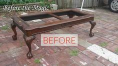 an old coffee table sitting on top of a brick patio