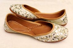 * Bridal wedding gold flat shoes with mirror embroidered work as shown above. * comfortable in wear. * Perfect for every occasion. * best in quality. * Handmade by me. Please chose your size from the below chat. If you are not sure about your size, please let us know.We ll help you out. Sizes: - US 4.5 - EU 34 - 22.5 cms - US 5 - EU 35- 23cms - US 6 - EU 36- 23.5 cms - US 7- EU 37- 24 cms - US 7.5- EU 38- 24.5 cms - US 8.5- EU 39- 25 cms - US 9- EU 40- 25.5 cms - US 10- EU 41- 26 cms - US 11- EU Bollywood Style Party Flats With Cutdana, Bollywood Style Flats With Mirror Work For Party, Bollywood Style Party Flats With Mirror Work, Gold Handwork Flats For Party, Wedding Shoes With Gold Embroidery, Gold Flats With Dori Work For Wedding, Gold Flats With Gota Work For Wedding, Bollywood Style Wedding Shoes With Zari Work, Gold Flats With Handwork For Wedding