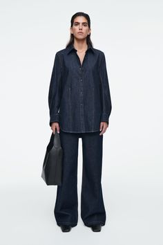 OVERSIZED DENIM SHIRT - INDIGO - Shirts - COS Denim Blue Relaxed Fit Top With Patch Pockets, Relaxed Fit Denim Blue Top With Patch Pockets, Denim Blue Top With Patch Pockets And Relaxed Fit, Oversized Dark Wash Shirt For Spring, Oversized Long Sleeve Denim Top For Work, Workwear Denim Blue Top With Patch Pockets, Workwear Denim Top With Patch Pockets, Spring Workwear Denim Top With Patch Pockets, Oversized Denim Shirt For Work