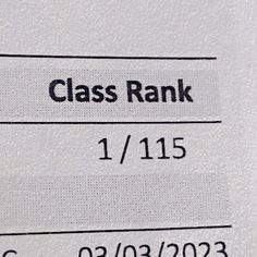 a close up view of the name and date on a glass rank label, which reads class rank 1 / 11 / 15