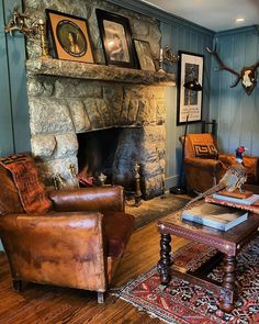 a living room filled with furniture and a fire place