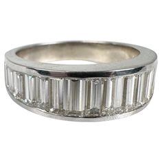 a white gold ring with baguets