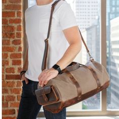 "Londo Canvas Duffel Bag - Vintage Retro Travel Bag Overnight Weekender Bag Carry-On Luggage Bag with Adjustable Shoulder Strap & Interior Pocket - Stylish Gym Bag for Men & Women Get Ready to FINALLY Enjoy Travel the Way You Deserve with our Trusted Duffel Bag! Do you take frequent business trips? Perhaps you are fond of short getaways to nearby destinations? Or you're just the type who wants to pack up to spend the weekend at your partner's or over at your parent's house? Regardless of where you have to or want to be, one thing's for sure: you're here because you need a trusted duffle bag for women/men travel bags to cover all your traveling needs! And, you're very lucky, because you've landed on the page of a duffel travel tote that's beloved for its premium quality, impeccable craftsma Gym Bag For Men, Canvas Duffel Bag, Mens Gym Bag, Canvas Travel Bag, Event Horizon, Leather Weekender Bag, Leather Weekender, Leather Duffel, Mens Travel Bag