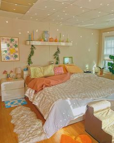 a bed room with a neatly made bed and lots of decorations on the wall above it