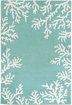 a blue rug with white snowflakes on it