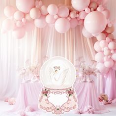 a table topped with lots of balloons next to a white plate on top of a table