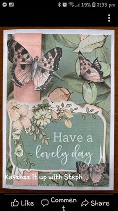 a card with butterflies and flowers on it