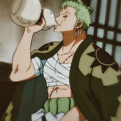 a male anime character drinking from a cup