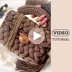 the video is showing how to make a woven purse