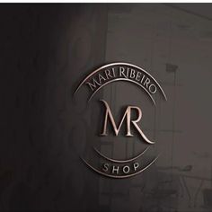 the mar ribebro shop logo is shown on a black background with gold lettering