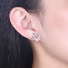 Features: Handcrafted using high-quality sterling silver that promises to last long even after regular usage without damaging Features a beautiful and chic flower design that looks perfect and flattering on everyone The hassle-free push back design makes the stud easy to wear and is good for those who always stay in a rush The intricate design and the simplistic look makes the earring perfect for women of every age A perfect gift option to your loved ones on special occasion to make it memorable Formal Earrings, Chic Flowers, Women Formals, Back Design, Trendy Jewelry, Sterling Silver Studs, Sterling Silver Earrings Studs, Ladies Party, Silver Earrings Studs