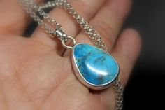 "Blue Kingman turquoise(Arizona mine) set in .999 fine silver/.925 sterling silver with a sterling silver chain/medium spring clasp. This necklace has a satin/brushed finish. READY TO SHIP. Each jewelry is made by hand, formed, forged, set and polished. Details * Necklace Length: 15\", 16\" OR 18\" * Pendant/Focal: Approx. 1.19\"H x .76\"W * Kingman Turquoise: 22.2 x 17.88mm * Metal Components: .999 Fine Silver; .925 Sterling Silver * Handmade by Tina KL It comes beautifully packaged + mini card Bohemian Minimalist, Silver Necklaces Women, Detailed Necklace, Kingman Turquoise, Wedding Jewellery Necklace, American Jewelry, Native American Jewelry, Sterling Silver Necklace, Necklace Length