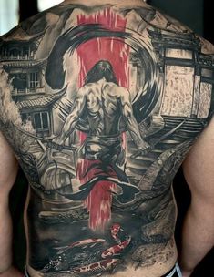 the back of a man's body with an image of a demon on it