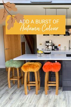 an image of a kitchen with stools in the center and text overlay that reads add a burst of autumn color