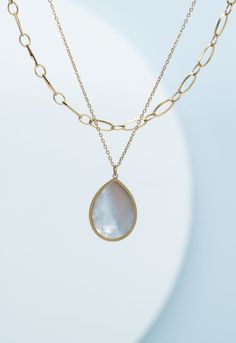 Nothing quite completes a look like a layer of gold necklaces and we’ve created the perfect no-fuss set for you! We’ve attached a chic 14k gold plated chain with a scalloped teardrop mother-of-pearl pendant to create this reversible, must-have piece. Whether you’re giving one as a gift or treating yourself, you’ll want to layer this set daily. It’s quickly becoming a favorite among the amazing survivors who crafted it!Materials 14k gold plated stainless steel and mother-of-pearl necklace Lead an Holiday Office Gifts, Starfish Project, Mother Of Pearl Pendant, Gift Catalog, Mother Of Pearl Necklace, Ethical Jewelry, Gold Necklaces, Curated Gifts, Gold Plated Chains