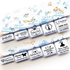 several labels are shown with different designs on them