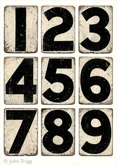 an old black and white sign with numbers on it