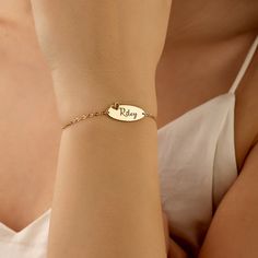 Elevate your accessory game with our exquisite Personalized Name Bracelet With Heart.  Orders; It is carefully produced by NisPersonalized. "MATERIAL"   -- 100% 925k Sterling Silver - This solid, precious metal is a classic that lasts forever. While it may darken over time, with continuous care and an occasional, it's as good as new. -- 18K Gold Plated - For those with an eye for striking gold, our gold jewelry uses sterling silver as a base and is plated with a durable and thick layer of 18-kar Bracelet With Heart, Gold Armband, Bracelet Dainty, Gold Engraving, Name Bracelet, Rose Gold Jewelry, Precious Metal, Charm Bracelets, Mother's Day Gift