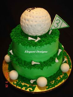 a green cake decorated with golf balls and flags