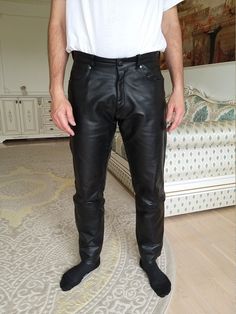 "Mens Leather pants L Leather Clothing Western Retro Pants Western Pants Mens pants black Leather Pants Cowboy pants Cowboy Trousers Please refer to photos for details of condition. Condition: very good vintage Measurements: Length: 105cm/41.3\" Inseam: 81 cm/31.9\" Waist: 86 cm/ 33.8\" Hips: 110 cm/ 43.3\" Rise: 28 cm/ 11.0\" Tag Size: UK-34; EUR-52 note The color on the pictures may vary due to monitor settings and light reflections. Ready to ship Please do not hesitate to contact with me for Classic Black Pants With Hip Pockets, Black Straight Leg Leather Pants With Belt Loops, Black Straight Leg Leather Pants With Pockets, Black Leather Trousers With Belt Loops, Black Leather Full-length Jeans, Black Slim Fit Pants With Standard Cut Leg, Classic Black Leather Pants With Pockets, Biker Style Black Leather Pants With Standard Cut Leg, Black Biker Leather Pants With Standard Cut Leg