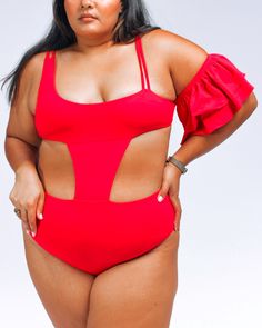 This one piece bathing suit is the perfect combination of fashion and function! The adjustable shoulder straps, ruffle sleeve, center panel and high waisted bottom ensure a flattering fit that will keep everything in place. With its medium coverage panty this swimsuit is sure to have you feeling stylish and confident all summer long! Make a splash in this plus-size one-piece from our size-inclusive swimwear collection. Mary Mercedes Swim Rafa ruffle sleeve high waisted one piece swimsuit | Red | Stretch Swimwear With Ruffled Straps For Summer, Chic Off-shoulder Solid Color Swimwear, Solid Ruffled Bodysuit For Poolside, Solid Color Ruffled Bodysuit For Poolside, Ruffled Bodysuit For Poolside, Solid Ruffled One-piece Swimsuit For Beachwear, Solid Ruffled One Piece For Poolside, Solid Ruffled One-piece For Poolside, Solid Color Ruffled One Piece For Poolside