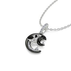 Shimmering with fascinating celestial style, this moon & star necklace draws all the right kinds of attention. Created in sterling silver, it showcases a black crescent moon adorned with glistening white stones, dots of stars, and a smaller silhouette of the moon. The fanciful design is completed with exquisite workmanship and dainty polishing details. This graceful necklace is reminiscent of the beautiful and arcane night sky. Make it a great gift for her on a special day!Carat Weight: 0.211 ct Black Star-shaped Sterling Silver Necklace, Black Moon Charm Jewelry For Gift, Mystical Black Round Necklace, Black Sterling Silver Symbolic Jewelry, Black Symbolic Sterling Silver Jewelry, Black Moon-shaped Jewelry For Gift, Black Moon Phase Round Pendant Jewelry, Black Moon Shaped Jewelry Gift, Black Moon Shaped Jewelry For Gift