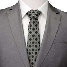 Show that you're willing to do any job for the right price with our Mandalorian Plaid Black Gray Men's Tie, featuring the helmet of the Galaxy's greatest bounty hunter. Set in a plaid pattern of gray and black, this tie gives you the confidence to answer any request with “As You Wish.” Experience the Force with our expertly crafted Silk Blend tie. It's built to withstand the tests of galactic events, infused with Jedi wisdom, and ready to accompany you on interstellar missions. Officially licens Gray Ties For Business, Gray Business Ties, Jedi Wisdom, Mandalorian Design, Bon Prix, Star Wars The Mandalorian, Men's Tie, The Mandalorian, Bounty Hunter