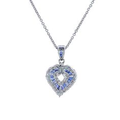 "This marvelous open heart shaped gemstone pendant necklace showcases baguette cut sapphires set in a channel setting & crafted in 14k white gold.The contemporary heart shaped pendant features bright round cut diamonds 0.50 c.t.w., color/clarity G,H-SI alternating with baguette cut sapphires 0.50 c.t.w. Enjoy a matching 14k white gold 18\" long chain with your purchase. Chain secures with lobster claw clasp. Necklace weight is 5.6 grams. For more information, contact Avital & Co Jewelry Heart Cut Sapphire Jewelry For Valentine's Day, Heart-shaped Sapphire Jewelry For Formal Occasions, Sapphire Jewelry For Valentine's Day Formal, Formal Heart-shaped Sapphire Jewelry, Valentine's Day Heart Cut Sapphire Jewelry, Heart-shaped Sapphire Necklace For Formal Occasions, Heart-shaped Sapphire Necklace For Formal, Formal Sapphire Heart Pendant Jewelry, Heart-shaped Sapphire Birthstone Jewelry