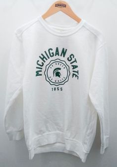 Michigan State Spartans Womens White Seal Script Crew Sweatshirt - 16650985 University Logo Sports Tops For Sports Season, Sports Tops With University Logo For Sports Season, University Logo Long Sleeve Tops For Sports Season, Long Sleeve University Logo Tops For Sports Season, Long Sleeve Tops With University Logo For Sports Season, Sporty University Logo Tops For Sports, Sporty University Logo Sports Tops, White Sporty Sweatshirt With Team Logo, Sporty Tops With University Logo For Sports