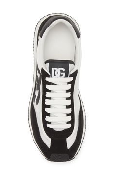 The iconic interlocking D&G logo emblazons the mesh paneling of this futuristic sneaker crafted from rich suede and featuring plush cushioning. Lace-up style Textile and leather upper and lining/synthetic sole Made in Italy Designer Shoes Lace-up Mesh Sneakers With Logo, Sports Sneakers With Logo Print And Mesh Material, Sports Mesh Sneakers With Logo Print, Lace-up Mesh Sneakers With Logo Print, Mesh Lace-up Sneakers With Logo Print, Sporty Mesh Sneakers With Logo Print, Luxury Sports Sneakers With Logo Print, Mesh Sports Sneakers With Logo, Luxury Logo Print Sneakers For Sports