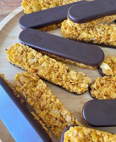 chocolate covered cookies are arranged on a plate