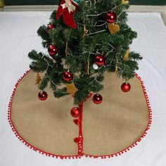 a small christmas tree with ornaments on it