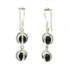 Sterling silver earrings 925/1000, with 6mm round black onyx. Stamped 925. Approximate weight 5.7grams. Length 3.0cm (1.2 inches), width 1.0cm (0.4 nches). All our jewels are made from solid sterling silver 925/1000 and are carefully crafted by hand in our family workshop. We dispatch your orders in 5 working days, worldwide and the postage is $5. We ship registered priority mail. Please allow 5-7 working days for delivery in Europe and 10-15 working days outside Europe. For any questions - plea Silver Onyx Earrings For Formal Occasions, Black Hallmarked Drop Earrings, Pierced Onyx Round Jewelry, Round Onyx Earrings, Black Sterling Silver Symbolic Earrings, Nickel-free Black Dangle Jewelry, Round Onyx Pierced Earrings, Onyx Silver Earrings, Black Nickel-free Drop Chandelier Earrings