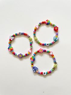 These unique Y2K-inspired bracelets are handmade by me with love. You will receive a bracelet that is very similar to the ones in the pictures with a fun and vibrant rainbow color-theme. Bracelets also come with kawaii charms like the flowers, butterfly, pastel pink heart, and smiley face. 🦋 If you want to customize this bracelet, feel free to add a name, initials, or short phrase in the personalization section. If you do not add a customization, you will receive the same bracelet but with no letters. Bracelets are perfect for stacking and are made with stretchy string so there's no need to worry about them snapping. Bracelets are also a super cute (birthday) gift idea for your bff(s)! For teenagers and women, we recommend our standard size of 6.5 inches, while kids may need a smaller siz Cute Multicolor Customized Jewelry, Customized Multicolor Cute Jewelry, Customized Cute Multicolor Jewelry, Personalized Pink Jewelry For Festivals, Whimsical Multicolor Jewelry For Friendship, Cute Multicolor Charm Bracelet For Jewelry Making, Fun Festival Bracelet Jewelry, Customized Cute Jewelry For Friendship, Customized Playful Friendship Jewelry