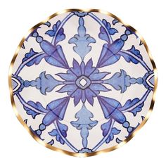 an ornate blue and white plate with gold trim