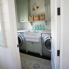 a washer and dryer in a small room