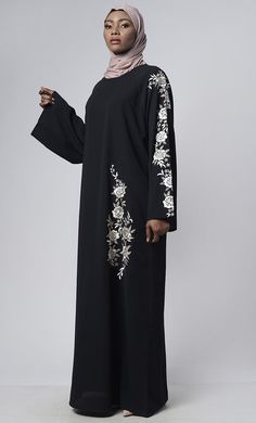 Round neck Ranglen full length sleeves Front with floral thread work Loose fit Fabric:-Nida Care:- Machine Wash Cold Eid Long Sleeve Abaya With Floral Embroidery, Eid Abaya With Floral Embroidery And Long Sleeves, Elegant Black Abaya With Floral Embroidery, Black Thobe With Floral Embroidery And Long Sleeves, Black Long Sleeve Thobe With Floral Embroidery, Black Abaya With Floral Embroidery, Black Long Sleeve Abaya With Floral Embroidery, Elegant Long Sleeve Thobe With Floral Embroidery, Long Sleeve Thobe For Eid