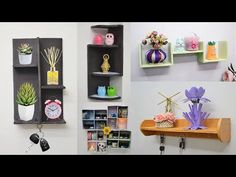 there are many different shelves on the wall with flowers and other things in them,