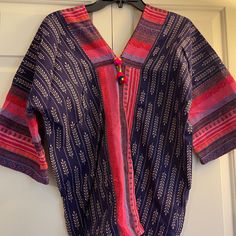 This Is A Very Unique Top That I Got From Northern Thailand On A Mission Trip Exactly Last Year. It Is Hand Woven And Very Thick Material With A Unique Design A Traditional Of The Northern Karen Tribe In Thailand. Brand New. If You Can’t Travel At Least You Can Feel Like You Did. The Thailand Size Is Usually One Size. And They’re Fairly Roomy Which Would Normally Fit A Size Small To-Medium Women’s. I Am Normally A Size Medium Top. Bohemian Cotton Patterned Tops, Purple Cotton Blouse With Relaxed Fit, Pink Bohemian Cotton Shirt, Multicolor V-neck Top With Relaxed Fit, Bohemian Cotton V-neck Top, Purple Bohemian Cotton Top, Relaxed Fit Multicolor V-neck Top, Multicolor Relaxed Fit V-neck Top, Casual Purple V-neck Shirt