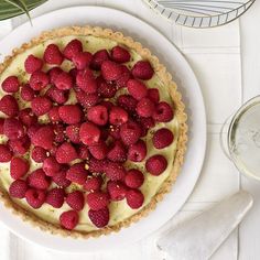 there is a pie with strawberries on it