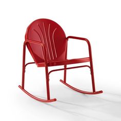 a red plastic rocking chair on a white background