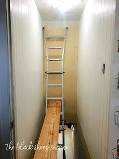 the ladder is going up to the top of the room in the hallway, and it's not too far from the door