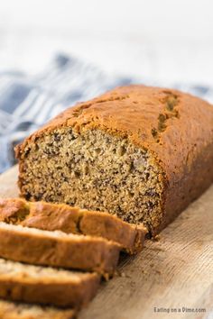 sliced loaf of banana bread on a cutting board