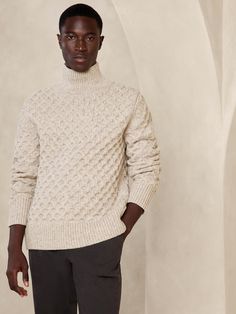 This warm wool-blend sweater uses a mock neck and a vintage-inspired honeycomb-like stitch to add luxurious texture.  Standard fit.  Mock neck.  Straight hem.  Standard fit.  Long sleeves.  Hip length.  Model: Size M, 6'2" (188cm). High Collar Sweater Men, Mens Mock Neck Sweater, Men’s Mock Neck, Mens White Wool Sweater, Men’s Fisherman Sweater, Black Mock Neck, Neck Sweater, Mock Neck Sweater, Wool Blend Sweater