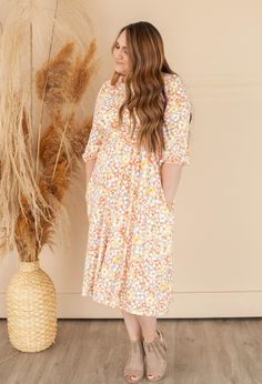 Who doesn't love a beautiful floral midi dress with a self-tie - and side pockets are great additions to this gorgeous soft luxe dress. It's the perfect length for all occasions and comfy enough for all day. Soft Stretchy Fabric. Also comes in Taupe and Mauve Floral. Model is 5'3 wearing large. 95% Polyester 5% Spandex 0-4 Small 5-9 Medium 10-12 Large 14-16 X Large Luxe Dress, Breath Of Fresh Air, Floral Midi Dress, Fresh Air, Stretchy Fabric, Love A, Floral Dress, Midi Dress, Long Sleeve Dress