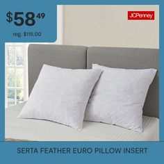 two white pillows sitting on top of a bed with the price $ 59 99 reg $ 51 00