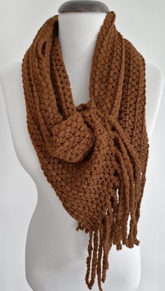 long fringe scarf, warm blanket scarf, knitted lace scarf, women fashion scarf, chunky knit scarf, winter scarf women, neck warmer scarf 𝗧𝗥���𝗜𝗠: Tassel Fringe 𝗙𝗔𝗕𝗥𝗜𝗖: Knitted Acrylic 𝗖𝗢𝗟𝗢𝗥: Brown 𝗠𝗘𝗔𝗦𝗨𝗥𝗘𝗠𝗘𝗡𝗦: 64" Length, 10" Width; excluding fringes 𝗦𝗛𝗔𝗣𝗘: Rectangle 𝗢𝗖𝗖𝗔𝗦𝗜𝗢𝗡𝗦: Birthday Gift, Bridesmaid Gift, Wedding, Anniversary Gift, Graduation Gift *Keeps your neck warm, soft, lightweight. *Please note that light effect, monitor brightness, contrast, etc. Fringe Fabric, Knitted Cowl Scarves, Chunky Knit Scarves, Tassel Scarf, Unisex Accessories, Fringe Scarf, Lace Scarf, Knit Cowl, Cowl Scarf