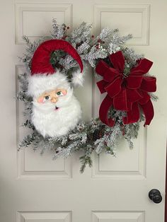 a wreath with a santa clause on it