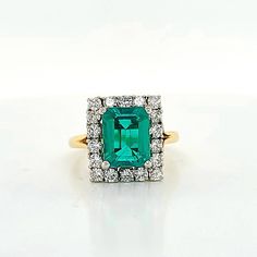 Gorgeous vintage 18K yellow gold engagement ring Gem green Colombia emerald. Center set treated green Colombia emerald in emerald shape weight 2.52ct. size 9x7mm very nice rich vivid green color nice luster, lively ,nice cut,Sparkly emerald and clean. side set round natural diamonds total weight 0.75ct. SI1-G Gorgeous setting ring solid gold Ring size 5 Resizable Retail Value $9,500 net. Appraisal available Green Emerald Cut Ring With Halo Setting, Heirloom Emerald Cut Green Wedding Ring, Green Emerald Cut Diamond Ring, Green Emerald Ring With Square Cut Center Stone, Green Wedding Ring With Emerald Cut And Center Stone, Heirloom Green Baguette Cut Emerald Ring, Gia Certified Square Cut Green Emerald Ring, Vintage Platinum Rings, Platinum Engagement Rings Vintage